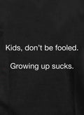 Kids, don't be fooled. Growing up sucks Kids T-Shirt