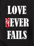 LOVE NEVER FAILS Kids T-Shirt