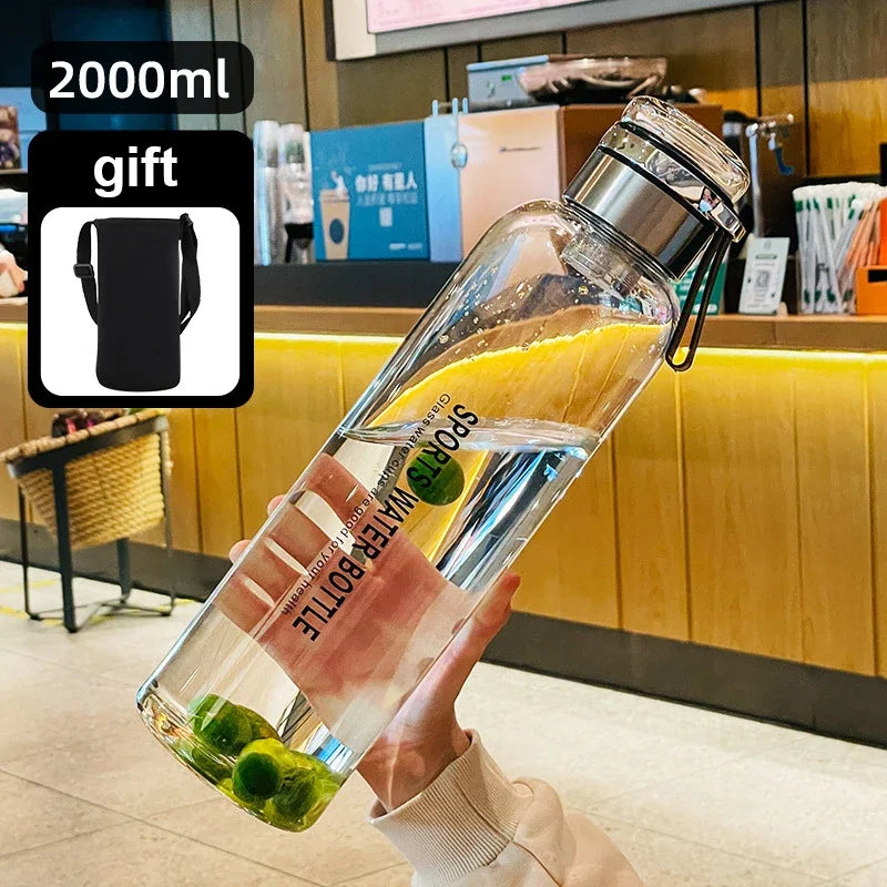 2L (67.6 fl oz) Borosilicate Glass Water Bottle – Leakproof Portable Bottle with Sleeve, Handle & Tea Filter