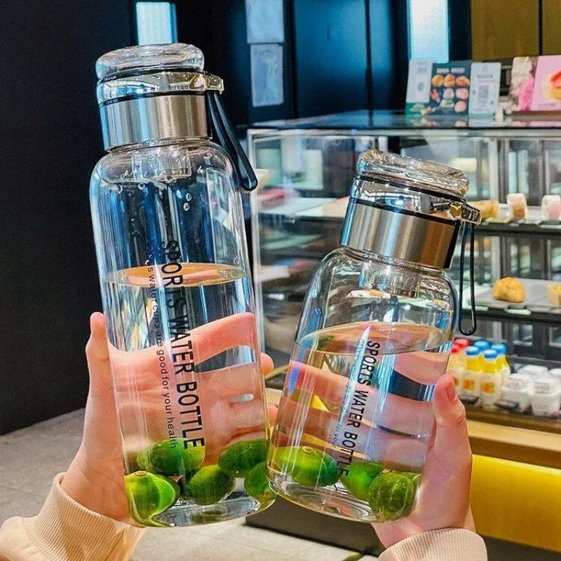 2L (67.6 fl oz) Borosilicate Glass Water Bottle – Leakproof Portable Bottle with Sleeve, Handle & Tea Filter
