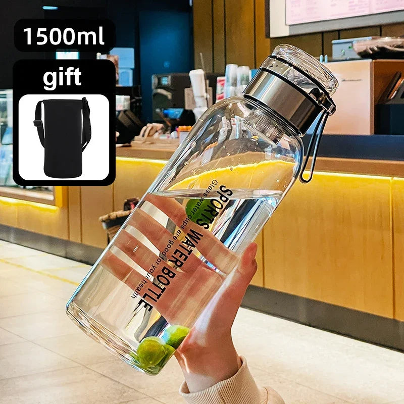 2L (67.6 fl oz) Borosilicate Glass Water Bottle – Leakproof Portable Bottle with Sleeve, Handle & Tea Filter