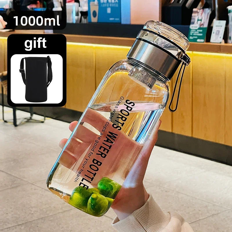 2L (67.6 fl oz) Borosilicate Glass Water Bottle – Leakproof Portable Bottle with Sleeve, Handle & Tea Filter